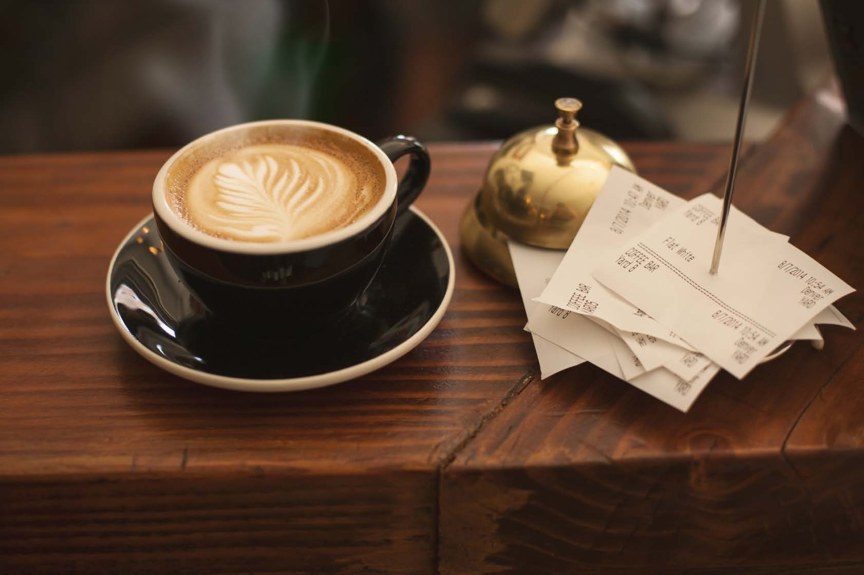steaming cup of coffee on table